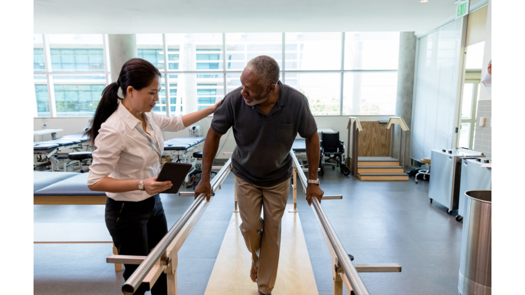 physical therapist with patient