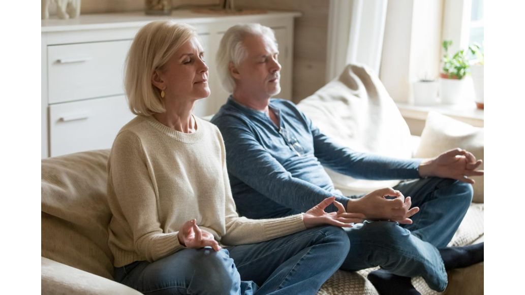 Woman & Man Meditating